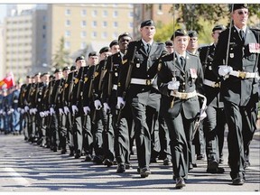 Numerous military units march along Victoria Street toward city hall during Freedom of the City parade in Regina on Saturday as part of Canadian Armed Forces Appreciation Day.