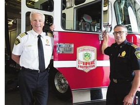 Outgoing Saskatoon fire Chief Dan Paulsen, left, says he has great confidence in the man who will replace him, Morgan Hackl, right, the current assistant chief.