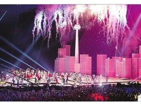 Performers dance while fireworks burst during the closing ceremony of the 2015 Pan Am Games in Toronto on Sunday. Although ticket sales for the games had a sluggish start, organizers ended up selling 1.05 million out of an available 1.3 million tickets.