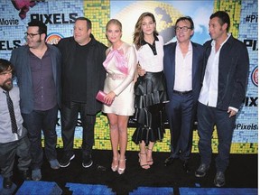 Peter Dinklage, left, Josh Gad, Kevin James, Ashley Benson, and Michelle Monaghan, with Pixels director Chris Columbus and Adam Sandler. Columbus looked to 'surround Adam' with strong actors, with both dramatic and comedic skills. 'That was our goal and Adam felt the same way.'