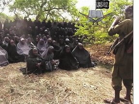 Photo taken from video by Nigeria's Boko Haram terrorist network on May 12, 2014, shows missing girls alleged to have been abducted from the town of Chibok in Nigeria.