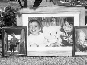 Photos of Alan and Ghalib Kurdi and their mother Rehanna are shown outside the home of their aunt, Tima Kurdi, in Coquitlam, B.C.