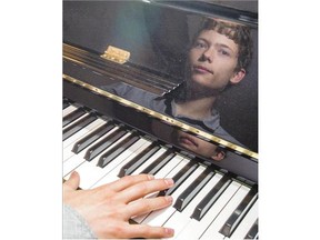 Pianist Godwin Friesen plays the piano at his home on Monday. Friesen took home rst place in the piano competition at the 45th Federation of Canadian Music Festivals' National Music Festival held in Edmonton over the weekend. See story on page C1