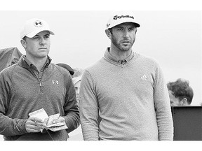 U.S. players Jordan Spieth, left, and Dustin Johnson chat during the first round at the British Open on Thursday.