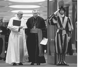 Pope Francis and Cardinal Pietro Parolin are saluted by a Swiss guard as they leave the Synod of bishops at the Vatican on Monday. Claims have surfaced that clergy with 'homosexual tendencies' are sent to a religious retreat to be 'cured.'