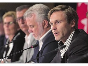 N.B. Premier Brian Gallant, right, fields a question at the closing news conference of the summer meeting of Canada's premiers in St. John's, N.L., on Friday. The Canadian Energy Strategy they came up with leans heavily on vague intentions.