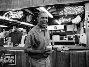 U.S. President Barack Obama gets a beer and a pork chop as he visits the Iowa State Fair in Des Moines during an unannounced campaign stop in 2012. For presidential hopefuls, the fair provides an opportunity to have candid interaction with voters and shows off a side of themselves not often seen on television.