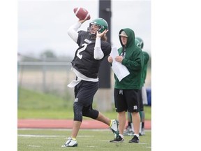 U of S Huskies quarterback, Drew Burko, can be seen throwing a pass during Huskies football camp. This year, the Green and White are hoping for a strong start to the season.
