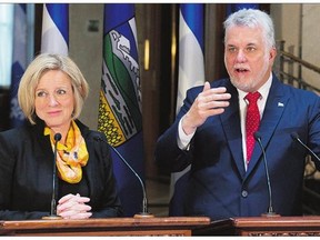 Quebec Premier Philippe Couillard, right, and Alberta Premier Rachel Notley at a joint news conference in Quebec City on Tuesday after the two leaders met to discuss the need for the Energy East Pipeline project.