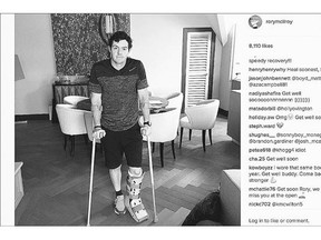 The No. 1 ranked golfer, Rory McIlroy, is shown on crutches and with his left leg in a walking cast on Monday. McIlroy ruptured a ligament in his left ankle playing soccer less than two weeks before the start of his British Open title defence.