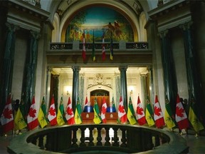 Prime Minister Stephen Harper, left, and Saskatchewan Premier Brad Wall hold a news conference at the Legislative Building in Regina on Friday.