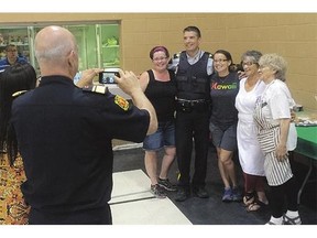 Relatives Sharon Ross, left, RCMP sergeant Brian Kelly, Anne Calladine, Ollie Kelly and Margaret Beament were reunited at the Jonas Roberts Memorial Community Centre after returning to the Lac La Ronge Indian Band reserve Saturday.