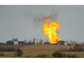 Remaining gas is burned off after explosion and fire at a gas pumping station owned by TransGas near Prud’homme, Sask., Saturday, October 11, 2014.