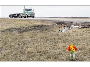 The remains of a crash scene near Spalding, seen a day after the May 3 accident. Three Carrot River teenagers were killed when their vehicle was struck from behind by a truck. The driver has now been charged with criminal negligence.