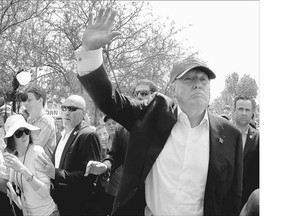 Republican candidate Donald Trump waves to the crowd at the Iowa State Fair Saturday, in Des Moines.