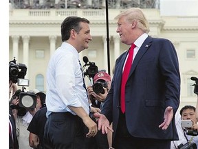 Republican presidential candidates Sen. Ted Cruz, left, and Donald Trump greet each other during a rally on Capitol Hill in Washington, D.C., on Wednesday.