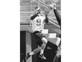 Rider Nic Demski catches a pass in practice in Regina on Tuesday.