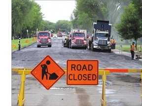 Road construction on Avenue P North. Contractors are doing as much paving as possible at night to minimize disruption.