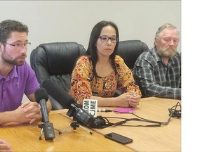La Ronge Mayor Thomas Sierzycki, left, Lac La Ronge Indian Band Chief Tammy Cook-Searson and Air Ronge Mayor Gordon Stomp speak at a news conference in Air Ronge Saturday. All three were impressed with the recent work of firefighters.