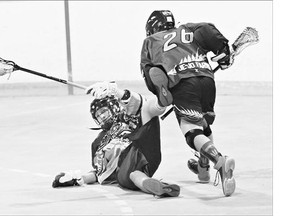 Saskatchewan's Liam Nolin finds some running room against B.C. on Tuesday during the bantam box lacrosse nationals at Kinsmen Arena. The team from B.C. won 8-2. Later in the day, Saskatchewan lost 16-0 to Ontario. They fall to 0-3 at the tournament.