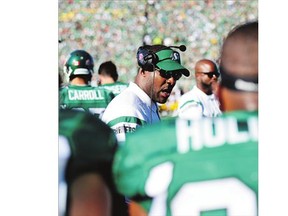 Saskatchewan Roughriders head coach Corey Chamblin talks to the defence at Mosaic Stadium in Regina on Sunday. He and GM Brendan Taman were fired Monday night.