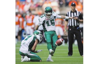 Saskatchewan Roughriders' Paul McCallum kicks an extra point convert as Weston Dressler holds. The rule change for extra points is having the desired effect in the league so far.