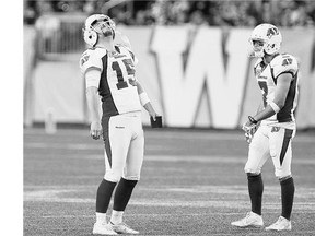 Saskatchewan Roughriders' Paul McCallum, left, won't be kicking for the team for the rest of the season unless replacement Tyler Crapigna is injured.