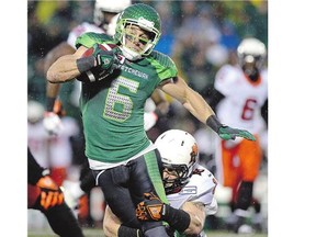 Saskatchewan Roughriders wide receiver Rob Bagg, is brought down by BC Lions linebacker Alex Hoffman-Ellis during rst half CFL action at Mosaic Stadium in Regina on Friday.