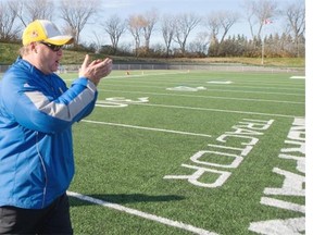 Saskatoon Hilltops head coach Tom Sargeant cheers after his team defeats the Winnipeg Rifles in PFC semifinal playoff action at SMF Field, October 18, 2015.