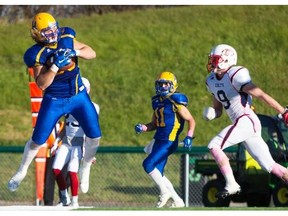 Saskatoon Hilltops offensive linemen Terry Thesen speaks to team members after the Hilltops defeated the Winnipeg Rifles in PFC semifinal playoff action at SMF Field on Sunday.