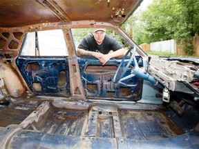 SASKATOON,SK--JULY 07/2015--Calvin Heilman Friday, August 07, 2015  with the car he is working on for a demolition derby at The Ex this weekend.