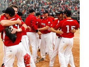 Team Canada celebrates after winning the 2015 World Softball Championship 10-5 against New Zealand at Bob Van Impe Field on Sunday July 5th, 2015.