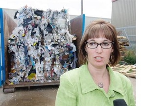 SASKATOON, SK — JUNE 23/2015 — Brenda Wallace, Director of Environmental and Corporate Initiatives with the City of Saskatoon, speaks about excess garbage being put in recycling by multi-unit buildings, Tuesday, June 23, 2015. The bin behind her is full of garbage Cosmopolitan Industries separated from what is supposed to be recyclable waste. (Greg Pender/The StarPhoenix)