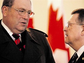 Saskatoon Mayor Don Atchison speaks to Ralph Goodale in 2005. The mayor is hopesful the re-elected Liberal Regina MP