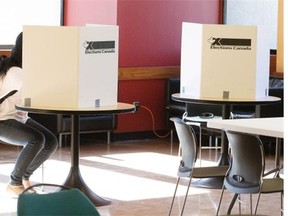 Students cast their ballot in a poll open in the Education Building at the University of Saskatchewan,  Thursday, October 08, 2015.