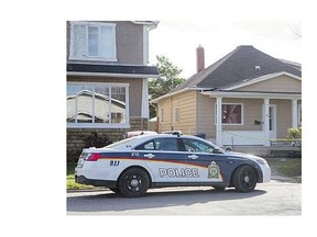 Saskatoon police attend the scene of a home where a man was found dead.