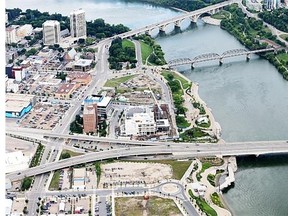 Saskatoon’s River Landing can be seen in this aerial photo over the banks of the South Saskatchewan River. Officials with the Downtown Business Improvement District say having River Landing operating on separate parking system may be inconvenient for those in the downtown — especially those from outside of the city.