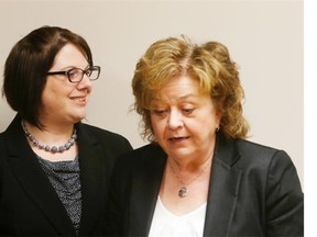 Social Services minister Donna Harpauer, right, and Alison Robertson, co-chair of the advisory group on poverty reduction.