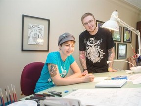 SASKATOON, SASK — AUGUST 07 2015-Saskatch-a-Man graphic novel/comic authors Mark Allard, right, and Elaine Wil pose for a photo in their home on Friday, August 7th, 2015.