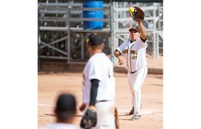 SASKATOON, SASK — North Battleford Petro Hawks first basemen Arlen Yuzicappi Calvin McNab grabs the ball to tag out a member of the Saskatoon Diamondbacks during the Softball Saskatchewan Senior A men’s provincial championship at Bob Van Impe Stadium on July 18, 2015. LIAM RICHARDS/the StarPhoenix)