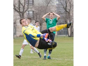 University of Lethbridge Pronghorns keeper Nolan French makes a save against the University of Saskatchewan Huskies while Tyler Redl reacts in CIS men’s soccer action on Sunday.