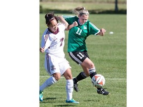 Ali Goodman (11) battles Griffins' Reagan Zilkie (7) in CIS action at the University of Saskatchewan Sunday.