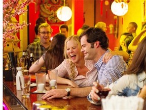 Amy Schumer is paired with Bill Hader in Trainwreck, a more-or-less predictable but always funny rom-com, written by Schumer. Photo: Universal Pictures Photograph by: Photo Credit: Universal Pictures