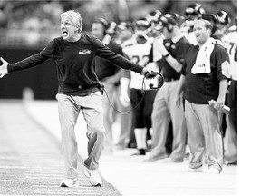 Seattle head coach Pete Carroll yells during the fourth quarter against the Rams in St. Louis. Carroll's decision to start overtime with an onside kick garnered criticism.