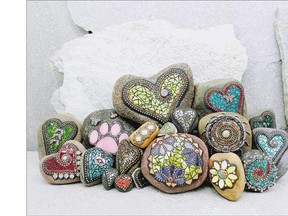 A selection of mosaic stones handcrafted by Chris emmert, of eugene, ore. emmert has been creating mosaic rocks since 2006. 'i still enjoy doing it because i like the rocks. There's never a bad rock out there,' she says.