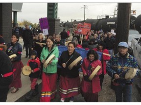 Several hundred walkers and marchers gather at Sunday's 10th-annual Sisters in Spirit Vigil to honour murdered and missing indigenous women.