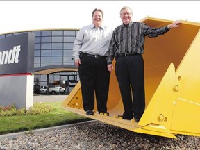 Shaun, left, and Gavin Semple, who head the Brandt Group of Companies, pose outside their Regina headquarters in 2011.