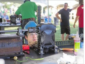 Shaun Webb, from Local 2736 British Columbia, competes in the millwright event during the United Brotherhood of Carpenters and Joiners of America (UBC) National Apprenticeship Contest at Kiwanis Park North on Saturday.