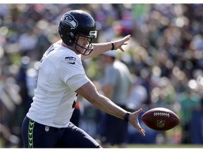 Seattle Seahawks kicker Jon Ryan practices during the team's training camp on Aug. 6, 2015, in Renton, Wash. (AP Photo/Elaine Thompson)