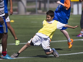 Hall Lake evacuee Atlee Charles participated in soccer games organized by the Astra Soccer Academy at the SaskTel Center Wednesday.
